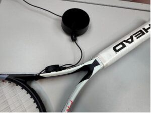 Zips Alerte sur l'utilisation d'un enrouleur de boucle réglable sur une raquette de tennis